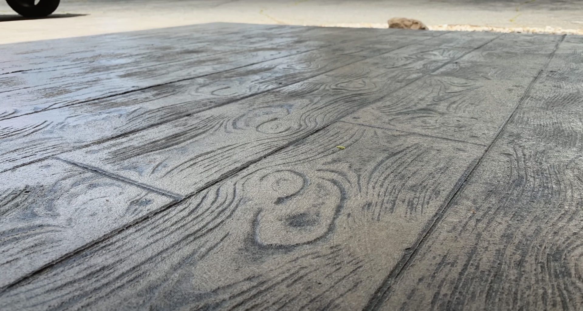 Stamped Decorative Concrete Patio Installation Stamped decorative concrete patio with wood grain pattern finish