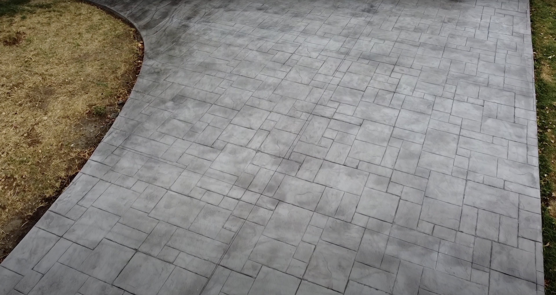 Beautiful stamped concrete patio installation in Newton MA